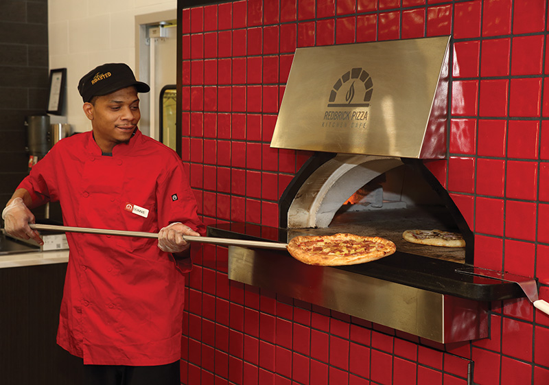 Chef with brick oven