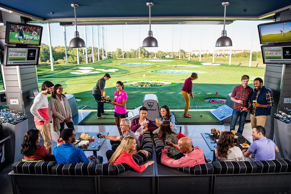 Guests playing Topgolf in Naperville IL