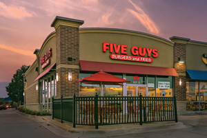 FIVE GUYS at dusk